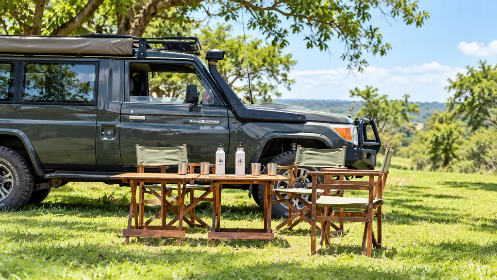 Game drive en Masai Mara con vehículo 4x4 preparado para la salida